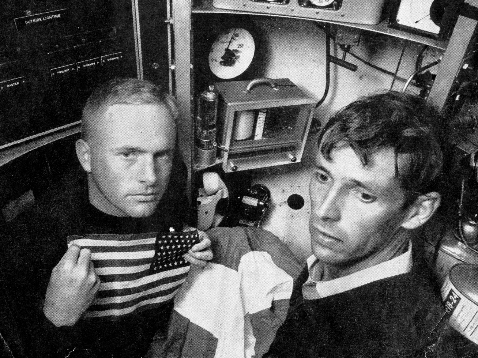 Lieutenant Don Walsh (left) and Jacques Piccard in the bathyscaphe.