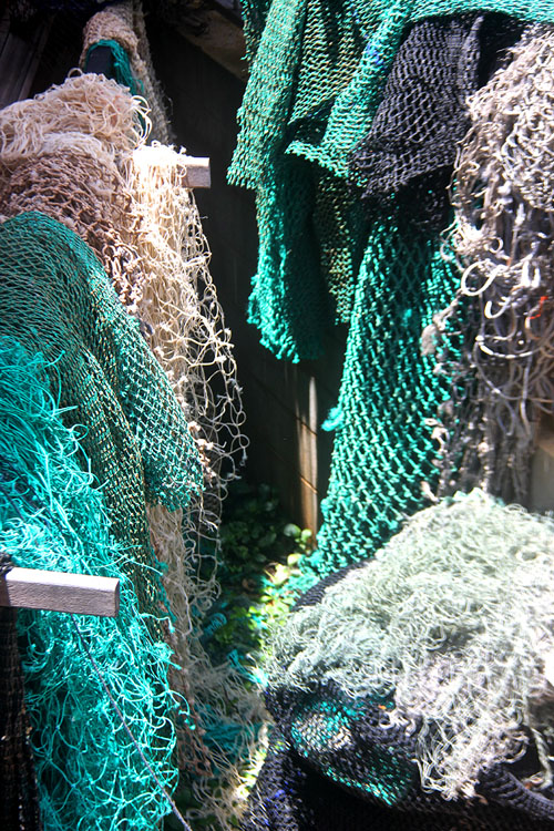 Rangers recover, clean and process the net before the artists reuse the fibres to create ghost net art. Image: Erub Arts.
