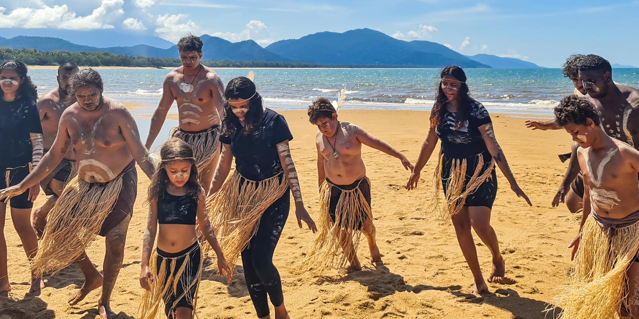 The Yidinji Dancers performing Birriniy on Bramston Beach in Queensland