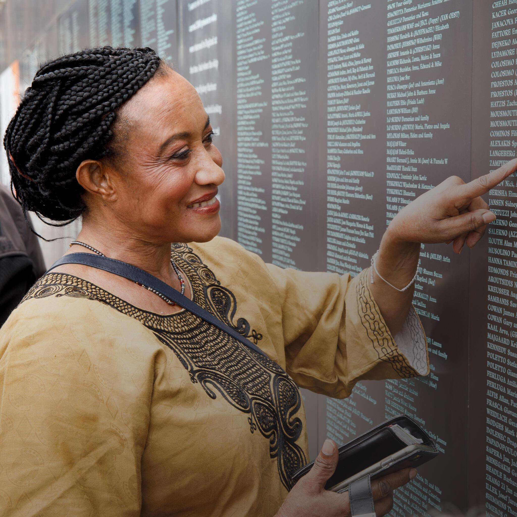 Female in front of  the National Monument