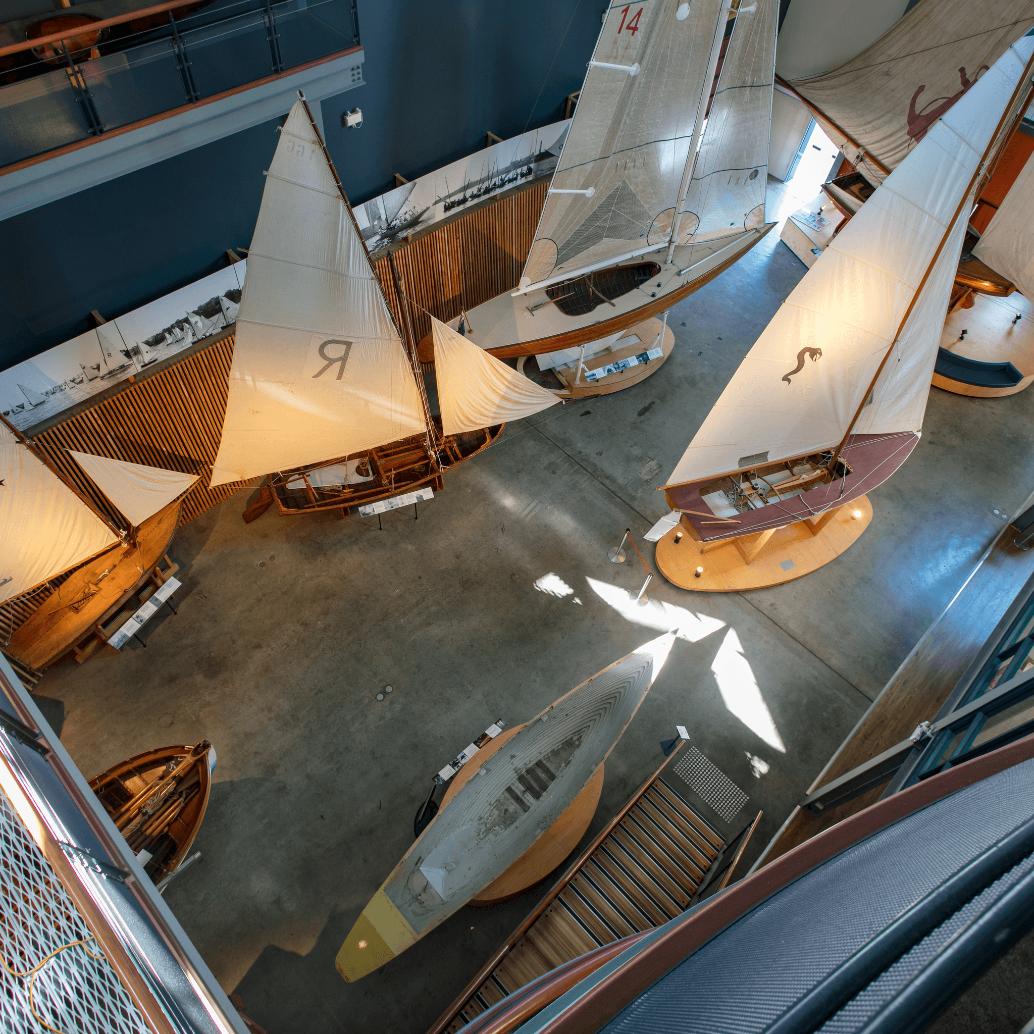 Overhead view of the Sydney Heritage Fleet sail boat display inside the foyer