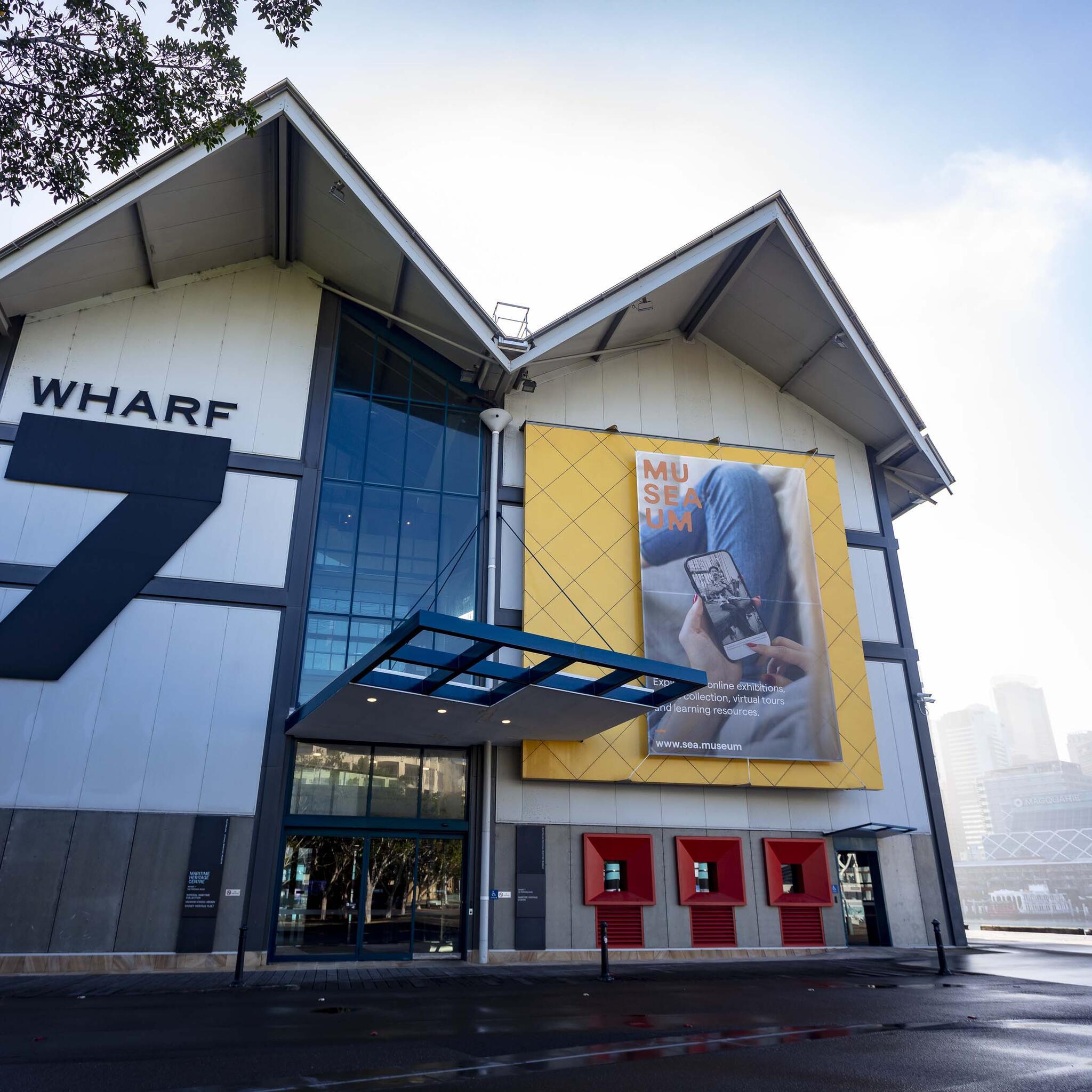 photo of large wharf building, with giant number 7 on it.