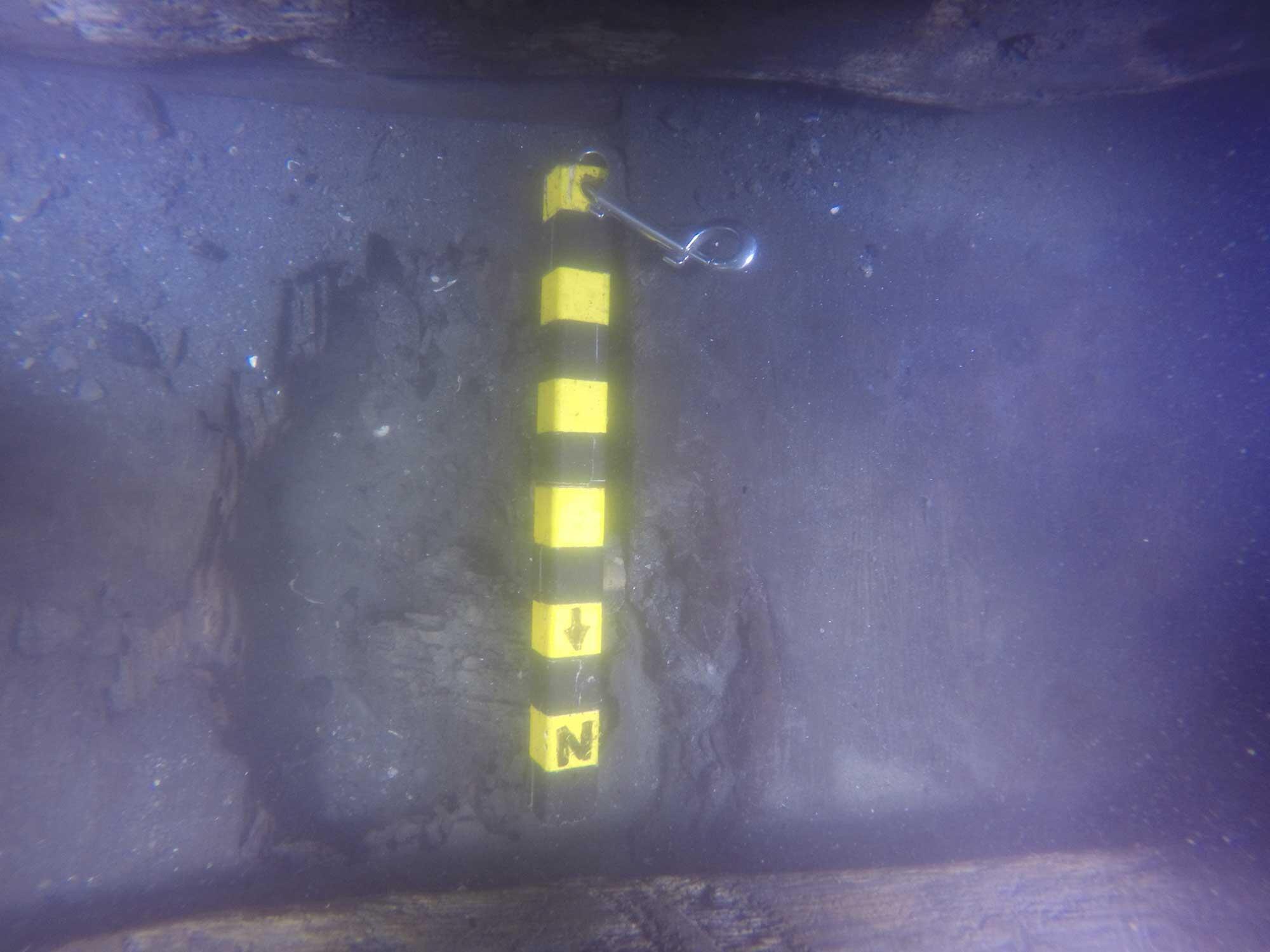 Crude scuttling hole found immediately adjacent to RI 2394’s keel in 2018. 